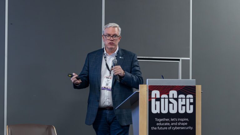 Sean Flynn on stage at GoSec 2026